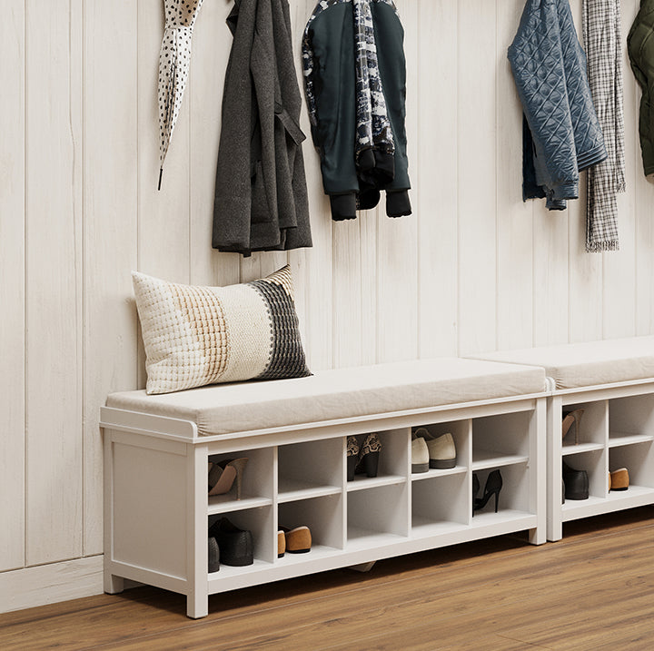 two shoe storage benches placed in farmhouse decorated mudroom